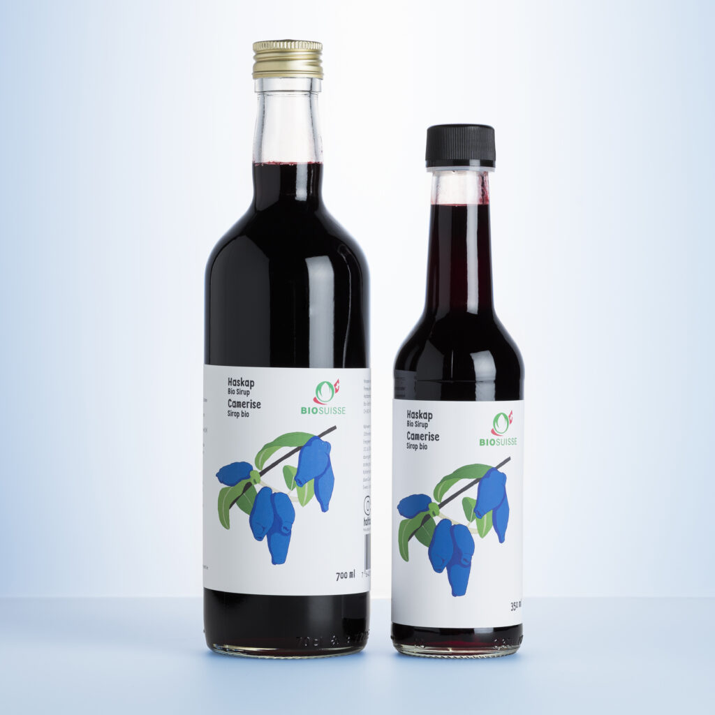 Bio Haskap Sirup in zwei Flaschengrößen